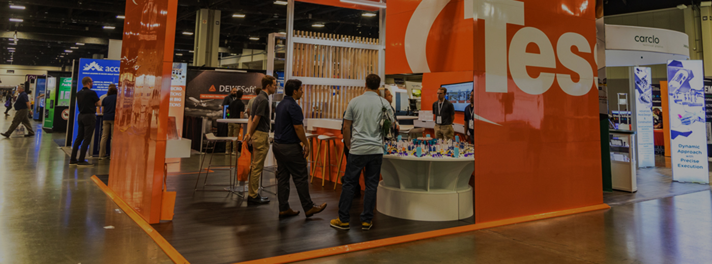 Attendees and exhibitors walking the expo hall